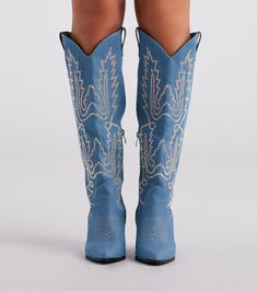 Unveil your glamorous country style in these must-have denim cowboy boots perfect for a rodeo or country festival! They feature a pointed toe. side zipper closure. classic western-inspired stitching with sparkly iridescent rhinestone embellishments. and a stacked block heel. Complete the look in a trendy hat.Fit & Features Pointed toe Side zipper closure Western-inspired stitching Iridescent rhinestone embellishments Stacked block heel Denim material Runs true to size Western Denim Boots For Rodeo, Western Boots With Zipper Closure, Western Fitted Boots With Zipper Closure, Fitted Western Boots With Zipper Closure, Blue Rhinestone Boots For Fall, Western Boots With Zipper Closure For Spring, Denim Cowboy Boots, Rhinestone Cowboy Boots, Denim Cowboy