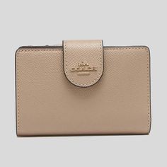 Nwt Coach Medium Corner Zip Wallet Taupe Details 100% Authentic,Money Back Guaranteed Crossgrain Leather Seven Credit Card Slots Bill Compartment Id Window Zip Pocket Snap Closure 5" (L) X 3 1/2" (H) X 1/2" (W) Beige Leather Coin Purse With Coin Pocket, Leather Beige Coin Purse, Beige Leather Wallet With Interior Card Slots, Everyday Beige Bag With Coin Pocket, Classic Beige Leather Wallet, Beige Leather Bag With Card Slots, Beige Travel Bag With Coin Pocket, Beige Travel Coin Purse With Coin Pocket, Classic Beige Bifold Coin Purse