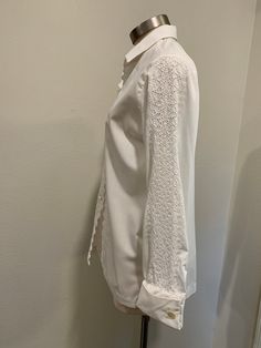 1970's Vintage White Blouse ~ Rhonda Lee, Says Size 34 But a Large, Button Down, Long Gorgeous Cut Out Sleeves, Slits on sides of Bottom of Blouse, Has 2 Button Cuff Links for Each Sleeve ~ Great Quality & Condition I will be mailing this Priority Mail or First Class International. Measurements Bust 40 Inch Waist 38 Inch Hips 40 Inch Shoulder to Shoulder 16 Inch Sleeve ~ Cuffed 23 Inch And UnCuffed 24 1/4 Inch Length ~ 27 1/2 Inch Slits on sides ~ 3 1/2 Inch Fitted Button-up Blouse With Lace Cuffs, Button-up Blouse With Lace Cuffs For Work, Workwear Button-up Blouse With Lace Cuffs, Workwear Blouse With Lace Cuffs And Button-up, Long Sleeve Blouse With Button Closure For Wedding, Classic Blouse With Lace Cuffs For Work, Vintage Formal Blouse With Button Cuffs, Daywear Button-up Blouse With Lace Cuffs, Fitted Button-up Shirt With Lace Trim