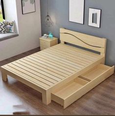 a wooden bed frame with two drawers on the bottom and one drawer open in front of it