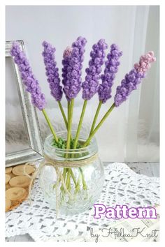 lavender flowers in a glass jar on a doily