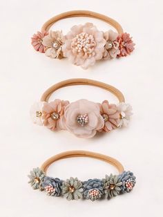 Add a touch of elegance to your little one's hairstyle with our 3-Piece Ivory-Colored Craft Flower & Rhinestone Decorated Seamless Elastic Hair Ties. Perfect for baby girls, these adorable hair ties feature delicate craft flowers and sparkling rhinestones, providing a stylish and comfortable way to keep hair in place. Ideal for any occasion, your baby girl will look charming and feel comfortable all day long. Socks Photography, Craft Flowers, Baby Boy Shirts, Flower Crown Headband, Baby Outerwear, Girl Flower, Elastic Hair Ties