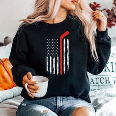 Buy Hockey American Flag Hockey Shirt at Fantasywears. Hight quality products with perfect design is available in a spectrum of colors and sizes, and many different types of shirts! Unisex T-Shirt – 100% Cotton (fiber content may vary for different colors) – Medium fabric (5.3 oz/yd² (180 g/m²)) – Classic fit – Tear away the label – Runs true to size Women T-Shirt – 100% combed ringspun cotton (fiber content may vary for different colors) – Light fabric (4.3 oz/yd² (146 g/m²)) – Slim fit with a Casual American Flag Print Tops For Fall, Casual White Sweatshirt With American Flag Print, Casual Black Shirt With American Flag Print, American Flag Print Relaxed Top For Fall, American Flag Print Relaxed Fit Top For Fall, Relaxed Fit American Flag Print Top For Fall, Casual Black T-shirt With American Flag Print, White Long Sleeve T-shirt With American Flag Print, American Flag Print Cotton Shirt With Relaxed Fit