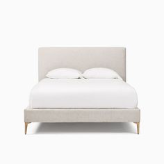 a bed with white sheets and pillows on top of it, against a white background