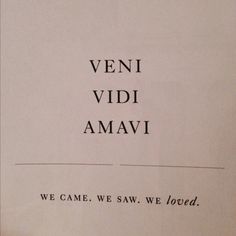 an old book with the words veni vidi amavi written in black ink