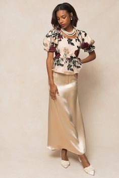 The Amora Top is a playful, champagne-colored piece with a unique multicolored floral print. The tulle overlay adds a touch of whimsy, while the sweetheart neckline and short puff sleeves with ruffle detailing give it a feminine flair. Plus, the peplum tier at the waistline adds a flattering shape. Complete with a hidden back zipper and full lining, this top is as functional as it is fun. Ivy City Women's Amora Top | Size: XXS Thanksgiving Dress, Girls Holiday Dresses, City Woman, White Dress Party, Matching Family Pajamas, Holiday Party Dresses, Mom Dress, Everyday Dresses, Girls Rompers