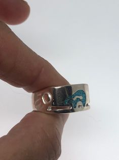 Cool Vintage Rock and Roll star men's ring Genuine stone Southwestern inlay Nice heavy ring, Silver white bronze Does not tarnish Unused stock from the 1980's I have an assortment of sizes from 7, 8-14 We have some half sizes. My jeweler can custom resize for $10-$20 fee Please add your size to the order in a message and I will send the size you require. If I am out of stock in your size, I will list the ones I have available for replacement. If I am sold out in the sizes you would prefer, I wil Artisan Silver Turquoise Ring With Inlay, Sterling Silver Inlay Jewelry, Bear Ring, Americana Vintage, Native American Style, Real Turquoise, Stone Inlay, Vintage Rock, Native American Fashion