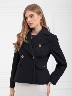 Beautifully tailored, the Victoria Jacket draws inspiration from the coat of the same name, taking your outerwear wardrobe to new heights. Double breasted, for classic elegance, with princess seaming and a fitted waist for a superbly flattering silhouette. Individually handmade in Portugal from exceptional quality Italian wool and fully lined with piping, it’s finished with antique brass buttons, chevron detail on the back, sleeves and pocket flaps, and a neckline that you can wear open or butto