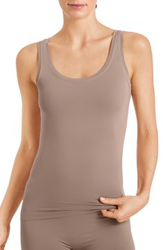 This seamless tank cut from buttery-soft microfiber comfortably stays in place and is perfect for layering. Style Name:Hanro Touch Feeling Tank. Style Number: 174618. Stretch Sleeveless Tops With Soft Touch, Stretch Camisole With Soft Touch, Seamless Second-skin Camisole Tank Top, Solid Stretch Camisole With Soft Touch, Seamless Scoop Neck Tank Top With Medium Support, Seamless Stretch Camisole For Everyday Wear, Seamless Medium Support Scoop Neck Tank Top, Solid Color Stretch Camisole With Soft Touch, Everyday Stretch Seamless Camisole