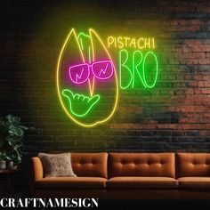 a neon sign that says pistachi bros on the side of a brick wall