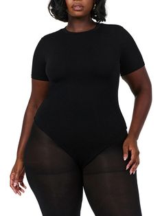 This bodysuit features a crew neckline and short sleeves that resembles a T. Features our signature double-lined fabric with stretch and comfort. Thong cut at the back with snap closures down below. NW Collection Import 95% Viscose, 5% Spandex Model wears size 1X True to size This body is double-lined All Bodysuits Are Final Sale Naked Wardrobe, Seductive Clothes, Curvy Women Outfits, Short Sleeve Bodysuit, Women Outfits, Crew Neckline, Final Sale, Heather Grey, Short Sleeves