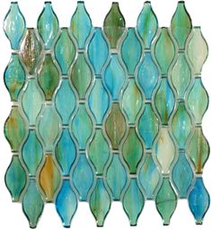 a glass mosaic tile with blue, green and yellow colors