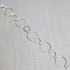 "Circle link bracelet handcrafted from .925 sterling silver circular links in multiple sizes. This handmade artisan bracelet can be worn as-is or charms, beads, birthstones or other jewelry pieces can be added to the links. Choose your size at checkout. Please measure appropriately prior to ordering. Add at least 1/2\" to your wrist size for the appropriate length. Enjoy!" Adjustable Sterling Silver Bracelet With Lobster Clasp, Adjustable Round Sterling Silver Bracelet, Sterling Silver Round Bracelet For Everyday, Everyday Round Sterling Silver Bracelets, Modern Hypoallergenic Sterling Silver Chain Bracelet, Everyday Sterling Silver Round Chain Bracelet, Modern Round Sterling Silver Bracelets, Modern Round Sterling Silver Bracelet, Hypoallergenic Sterling Silver Link Bracelet