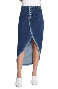 A high-low silhouette defines the look of this stretch-kissed denim skirt flaunting a cute fringe hem and glinting buttons on the front. Black is 66% cotton, 23% polyester, 10% rayon, 1% spandex; blue is 95% cotton, 4% polyester, 1% spandex Machine wash, tumble dry Imported Cute Fringe, Faux Wrap Skirt, Hooded Dress, Column Dress, Fringe Skirt, Wide Jeans, New Fashion Trends, Fashion Sewing, Wrap Skirt