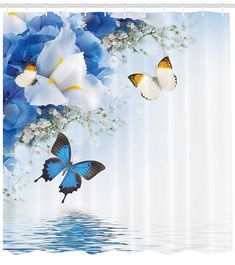 two butterflies flying over water with blue and white flowers