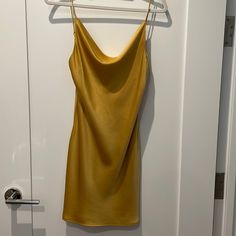 Purchased From Shop Planet Blue - Never Been Worn. Fits True To Size And Hits Me Mid Thigh (I Am 5’5) Has A Beautiful Subtle Cowl Neck. Fitted Gold Silk Mini Dress, Fitted Sleeveless Silk Dress For Brunch, Elegant Yellow Silk Slip Dress, Chic Yellow Slip Dress For Night Out, Chic Yellow Silk Mini Dress, Chic Gold Silk Mini Dress, Yellow Silk Dress For Night Out, Elegant Yellow Mini Dress With Spaghetti Straps, Spring Gold Silk Mini Dress