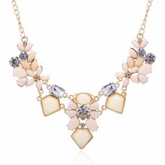 This lovely chunky floral necklace is the perfect compliment to virtually any outfit. Featuring a unique floral and geometric shaped flower and gemstone necklace. Comes in three fabulous colors from which to choose. Cocktail Party Jewelry, Flower Choker Necklace, Necklace Chain Types, Candy Necklaces, Choker Style Necklace, Flower Choker, Charm Chain, Gem Necklace, Jewelry Statement