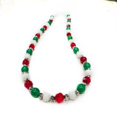 This colorful beaded necklace will easily become one of your favorite Christmas jewelry pieces.  Necklace is made with a variety of colors and textures making this unique holiday jewelry set a fan favorite! Holiday Necklace * Perfect jewelry gift * Colorful beaded necklace & earrings  * 23 total inches, end to end * 1 inch extender  Necklaces are READY TO SHIP!! Ship time is 3-5 business days. Free tracking.  MORE CHRISTMAS https://www.etsy.com/shop/MiksJewelryShop?search_query=christmas MORE NE Elegant Multicolor Jewelry For Holidays, Elegant Multicolor Holiday Jewelry, Christmas Gift Jewelry With Faceted Beads, Holiday Colorful Beaded Jewelry, Christmas Gift Beaded Necklaces With Round Beads, Handmade Christmas Necklaces For Festive Occasions, Holiday Festive Jewelry With Colorful Beads, Festive Holiday Jewelry With Colorful Beads, Holiday Jewelry With Colorful Beads