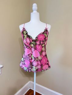 Vintage SILK Lilly Pulitzer Floral Camisole. Bright pink flowers with shades of green, brown. V neckline, narrow ruffled edge, stitching detail at bodice.  Adjustable straps, gathered skirt. L Side zip, back gather panel with loose stretch. All silk chiffon fabric with full silk lining. Size 8 average fit. Preowned, lightly worn, in nice vintage condition with no tears or stains found. Please check measurements below for accurate sizing. Bust 36-37" Underbust 33". Length from top to hem with str Fitted Floral Print Tank Camisole, Fitted Multicolor Floral Print Tank Top, Fitted V-neck Camisole With Ruffles, Fitted V-neck Floral Print Tank Top, Green Floral Print Tank Top, Multicolor Tank Camisole For Spring, Green Floral Print Tank Top For Spring, Fitted Floral Print V-neck Tank Top, Fitted V-neck Tank Top With Floral Print