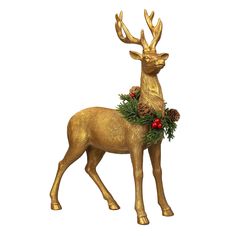 a gold deer statue with pine cones and berries on its antlers is standing in front of a white background