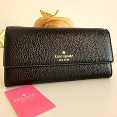 Southport Avenue In Black Pebbled Leather Classic Kate Spade Wallets For Daily Use, Black Leather Clutch With Rfid Blocking, Black Bifold Wallet With Removable Pouch, Kate Spade Leather Wallets For Everyday Use, Black Textured Leather Wallet, Kate Spade Everyday Bifold Bag, Luxury Everyday Kate Spade Wallets, Chic Kate Spade Bifold Wallet, Everyday Black Textured Leather Wallet