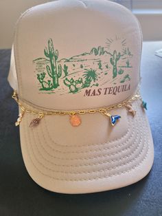 Beach Babe - Trucker hat chain! Fits any standard mesh-back hat. Attaches by 2 lobster claw clasps at each end. Adjustable Gold Cap, Gold Adjustable Cap, Adjustable Flat Brim Mini Hat As Gift, Adjustable Gold Hats For Gifts, Adjustable Gold Hats As Gift, Adjustable Gold Snapback Baseball Cap, Gold Snapback Hat With Curved Brim, Gold Adjustable Snapback Hat With Curved Brim, Adjustable Gold Snapback Hat