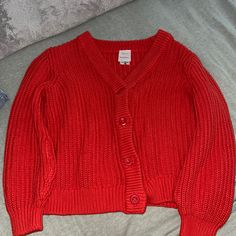 Hanna Anderson Button Down Red Sweater 4 Buttons Size 8 Never Worn Red Button-up Winter Sweater, Red Winter Sweater With Button Closure, Casual Red Cotton Cardigan, Casual Red Sweater With Buttons, Casual Red Button-up Cardigan, Red Button-up Sweater, Red Casual Cardigan With Buttons, Red Winter Tops With Button Closure, Red Long Sleeve Sweater With Button Closure