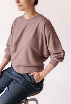 Our newest Women’s Sweatshirt is a must-have for moms on the go! Made from 100% organic French Terry cotton, a soft plush texture you'll recognize from your comfiest loungewear, each piece of this collection is garment dyed for a vintage washed look and has the softest hand-feel. With wide, dolman-style sleeves and a relaxed fit, you will be comfortable on the move or taking much needed moments of relaxation. The ribbed trim at the neckline and cuffs adds the perfect finishing touch. Better yet, Veggie Patch, Organic Baby Clothes, Soft Hands, Bottom Clothes, Rain Wear, Soft Plush, French Terry, The Go, Relaxation