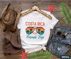 Looking for a cute, matching set of family trip vacation shirts for a Costa Rica Holiday in 2024 for the all ages?   If you are looking for a unique way to commemorate your upcoming friends or family vacation? Look no further than our custom family vacation shirt! Whether you're planning a cruise, a beach trip, or a Christmas  vacation, our shirts are perfect for capturing all the memories together. Plus, our designs are totally customizable with your family name and location of your trip - so y Trendy Pre-shrunk Shirt For Vacation, Relaxed Fit Family Matching T-shirt For Vacation, Family Matching Relaxed Fit T-shirt For Vacation, Family Matching T-shirt For Beach Season Vacation, Family Matching T-shirt For Beach Vacation, Casual Tops For Beach Season Family Vacation, Summer Travel Cotton Tops, Casual Letter Print Shirt For Family Vacation, Summer Cotton Top For Travel