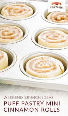 a pan filled with cinnamon rolls on top of a table