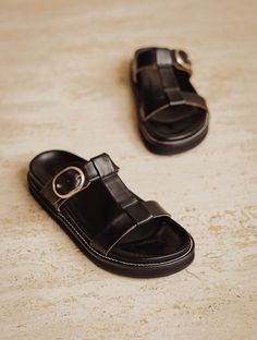 Fajar Passion Black - Flat sandals in black leather with gold buckle and arch-supporting anatomical insole Modern T-strap Sandals With Buckle Closure For Summer, Beach Sandals With Tang Buckle And Slip-on Design, Black Slingback Sandals With Buckle For Summer, Black T-strap Sandals With Buckle Closure For Spring, Summer Black Sandals With Buckle Closure, Chic Flat Footbed Sandals With Buckle Closure, Chic T-strap Sandals With Open Heel For Vacation, Black Footbed Sandals With Tang Buckle For Summer, Black Spring Footbed Sandals With Buckle