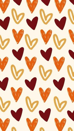 an orange and red heart pattern on a white background with hearts drawn in the middle