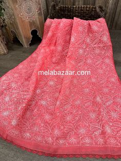 "Full size cotton dupatta with \"tepchi\" hand embroidery and crochet lace." Unstitched Cotton Lehenga With Traditional Drape, Unstitched Cotton Lehenga For Festivals, Festive Cotton Dupatta With Resham Embroidery, Traditional Cambric Dupatta For Wedding, Cotton Dupatta With Zari Work, Cotton Dupatta With Resham Embroidery For Festivals, Cotton Dupatta With Resham Embroidery For Navratri, Pink Unstitched Suit With Chikankari Embroidery In Jamawar, Navratri Cotton Dupatta With Resham Embroidery