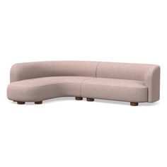 the curved sectional sofa is made from fabric and has two wooden legs on each side