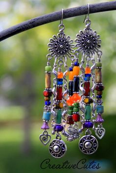 Colorful Rainbow Chandelier Earrings Silver Bees Hearts & | Etsy Bohemian Heart Beads Drop Earrings, Bohemian Beaded Heart Drop Earrings, Bohemian Heart Beads Earrings For Festival, Bohemian Festival Earrings With Heart Beads, Bohemian Earrings With Heart Beads For Festivals, Bohemian Multicolor Czech Glass Beaded Earrings, Bohemian Multicolor Beaded Earrings In Czech Glass, Spiritual Multicolor Dangle Beaded Earrings, Rainbow Chandelier