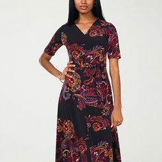 This MSK women's floral fit-and-flare dress features warm and vibrant tones that embody the spirit of the season. It's made from stretch fabric and has a V-neck, short fitted sleeves, a midi-length, and a tie-waist belt that flatters the figure. Wear it with strappy heels and hoop earrings.Features: Tie-WaistClosure Type: Pullover HeadNeckline: V NeckSleeve Length: Short SleeveSleeve Style: Fitted SleeveApparel Length: 47.5 Inches - BackDress Length: Midi LengthFiber Content: 95% Polyester, 5% … Flare Dresses, Medium Dresses, Fitted Sleeves, Floral Fit, Medium Dress, 5 S, Tie Dress, Fit N Flare Dress, Petite Dresses