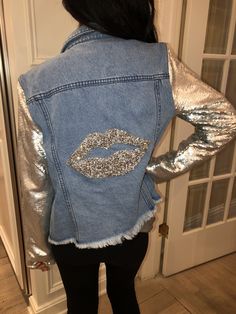 Silver sequined lips with sequined sleeves, jean jacket size M Trendy Spring Outerwear With Contrast Sequin, Winter Party Denim Jacket With Long Sleeves, Winter Party Denim Jacket Long Sleeve, Casual Long Sleeve Denim Jacket With Sequins, Party Denim Jacket With Embellished Long Sleeves, Party Denim Jacket Embellished, Embellished Denim Jacket For Parties, Denim Sequined Long Sleeve Outerwear, Long Sleeve Denim Outerwear With Sequins