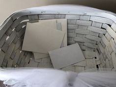 several pieces of paper sitting in a basket