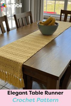 a wooden table with a bowl of bananas on it and the words elegant table runner crochet pattern