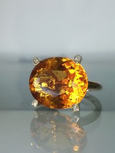 "14k Citrine Statement Diamond Ring, Citrine Ring 14K Yellow Gold, Citrine Oval Cut Ring, Citrine Gemstone Ring Gold, Yellow Engagement Ring ----------------------------------------------------------------------------- Please watch the video of this ring set on my Instagram page at this link: https://www.instagram.com/p/B1j6oN9Huz0/ ----------------------------------------------------------------------------- Citrine Sun SetRing. Just look at that perfect Brazillian orange Citrine VS clear gemst Elegant Citrine Rings With Large Stone, Yellow Engagement Ring, Luxury Citrine Crystal Ring Fine Jewelry, Luxury Multi-stone Citrine Rings, Yellow Citrine Hallmarked Rings, Luxury Hallmarked Citrine Rings, Orange Citrine, Oval Cut Ring, Yellow Engagement Rings