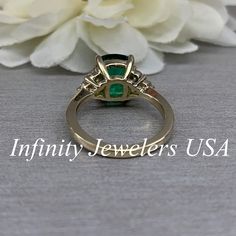 "This ring is an elongated cushion cut lab created green emerald with moissanite accents made with solid 14k yellow gold item #6650 We feature the finest quality lab grown emeralds in the world. The properties of lab-grown are physically, chemically and visually identical to natural, just grown in a lab setting. Emerald is the birthstone of May -Approximate total carat weight: 3.80ctw diamond equivalent -Center Stone Size: 10x8mm approx. 3.50ct diamond equivalent -Center Stone Shape: elongated c Classic Pear-shaped Emerald Jewelry, Emerald Marquise Cut Ring With Accent Stones, Marquise Cut Emerald Ring With Accent Stones, Classic Pear-shaped Emerald Ring For Anniversary, Formal Marquise Cut Emerald Ring, Classic Pear-shaped Emerald Ring Gift, Green Baguette Cut Jewelry With Accent Stones, Classic Marquise Cut May Birthstone Jewelry, Gia Certified Oval Emerald Ring, Perfect For Gift