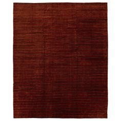 a brown rug with vertical stripes on it