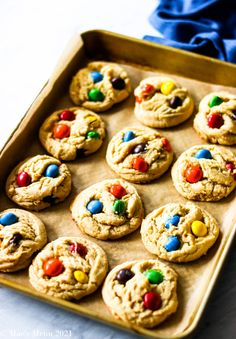 cookies with m & m's on top in a pan