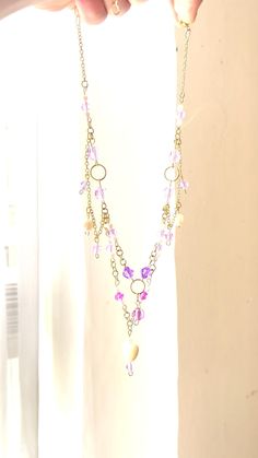 Each charm is carefully crafted and made on a 14.5-inch faux gold chain with an adjustable length. Whimsical Gold Necklaces With Lobster Clasp, Whimsical Gold Metal Necklace, Bohemian Purple Necklace With Heart Beads, Fairycore Purple Necklace For Gift, Whimsical Adjustable Gold Necklace, Handmade Purple Fairycore Jewelry, Handmade Gold Crystal Metal Necklace, Whimsical Gold Heart Necklace, Whimsical Adjustable Beaded Chain Jewelry