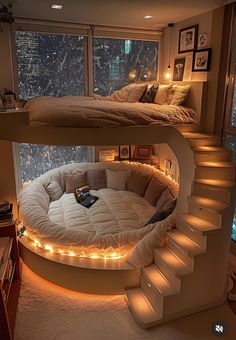 there is a bed with lights on the bottom and top bunk above it in this room