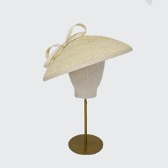 The Dior-style Italian straw percher from the Rachel Trevor Morgan collection is suitable for all occasions such as weddings, garden parties, investitures and racing events. Meets Royal Enclosure size requirements. Set with an elastic. Fits all head sizes. White Elegant Straw Hat, Elegant White Straw Hat, Summer Straw Hat With Structured Crown, Classic Beige Straw Hat For Formal Occasions, Formal Spring Straw Hat, Formal Straw Hat For Spring, Elegant Natural Straw Hat For Garden Party, Elegant Hat With Structured Crown In Natural Color, Elegant Natural Hat With Structured Crown