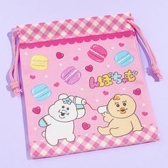 Store your trinkets inside this super kawaii drawstring pouch! It features cute prints of BFFs Npochamu and Kimimaro with colorful macarons. Simply pull the strings to close the bag! Kawaii Pink Bag For Gift, Cute Multicolor School Pouch, Kawaii Pink School Pouch, Kawaii Multicolor Bags As Gifts, Cute Multicolor Pouch For Personal Use, Kawaii Pink Pouch For Gifts, White Kawaii Pouch Gift, White Kawaii Pouch As A Gift, White Kawaii Pouch As Gift