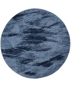 a round rug with blue and gray colors