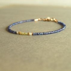 Elegant Sapphire Bracelets With Faceted Beads, Everyday Gold Sapphire Jewelry, Elegant Sapphire Bracelet With Faceted Beads, Everyday Blue Sapphire Jewelry, Everyday Yellow Gold Sapphire Jewelry, Blue Tanzanite Bracelet Jewelry, Dainty Blue Gemstone Beaded Bracelets, Blue Dainty Gemstone Beaded Bracelet, Dainty Blue Rondelle Jewelry