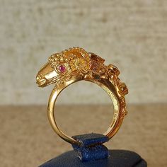 Byzantine style ring with ram head with natural sapphire Emerald, Rubies and Brilliant cut Diamonds, handmade Made of 18 carat solid yellow gold SHIPPING INFORMATION FREE SHIPPING VIA DHL EXPRESS Please fill in an active phone number It's required by the courier company DELIVERY TIME INFORMATION 1 - 3 Days EUROPE 3 - 5 Days to U.S.A and CANADA 5 - 8 Days to AUSTRALIA, SOUTH AMERICA, AFRIKA And to all the other countries around the world Antique Gold Ruby Ring With Diamonds, Fine Jewelry Gold Ruby Ring With Intricate Design, Gold Ruby Ring With Intricate Design, Luxury Gold Snake Ring With Gemstone, Luxury Gold Sapphire Open Ring, Luxury Gold Open Sapphire Ring, Exquisite Gold Ruby Gemstone Ring, Luxury Gold Ruby Ring With Intricate Design, Antique Gold Sapphire Ring With Diamonds